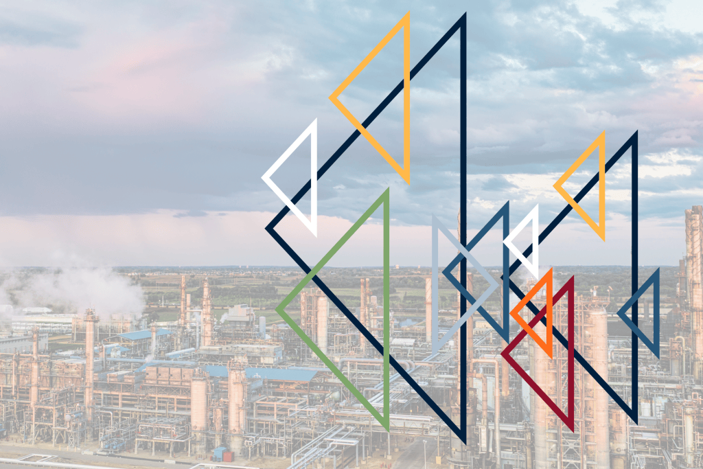 A digital artwork featuring colorful geometric shapes overlaying an industrial landscape with oil refineries in the background under a cloudy sky.